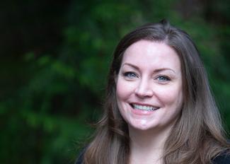 Smiling woman with long hair